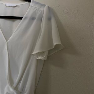 Lush- Vneck slim body suit blouse.